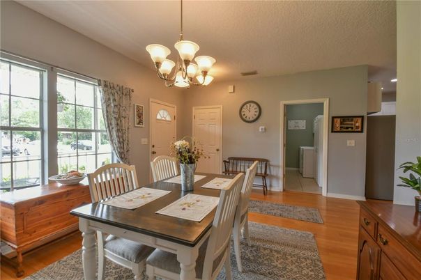 Chandelier, Dining room, Interior, Wood Texture Flooring
