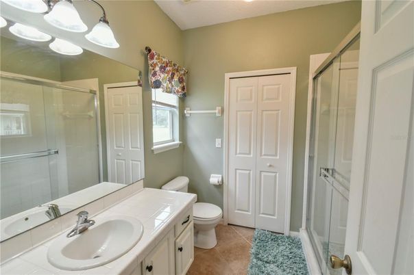 Bathroom, Dual Sink Vanities, Glass Shower, Interior, Tile Countertops