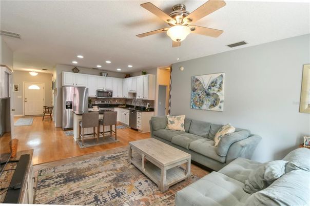 Dining room, Interior, Kitchen, Living room, Recessed Lighting, Stainless Steel Appliances, Wood Texture Flooring