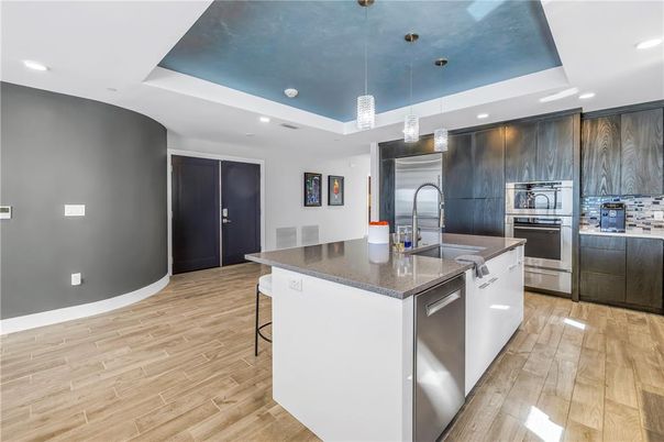 Interior, Kitchen, Pendant Lights, Recessed Lighting, Stainless Steel Appliances, Wood Texture Flooring