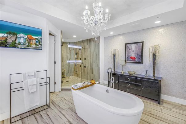 Bathroom, Chandelier, Free Standing Baths, Glass Shower, Interior, Recessed Lighting, Wood Texture Flooring