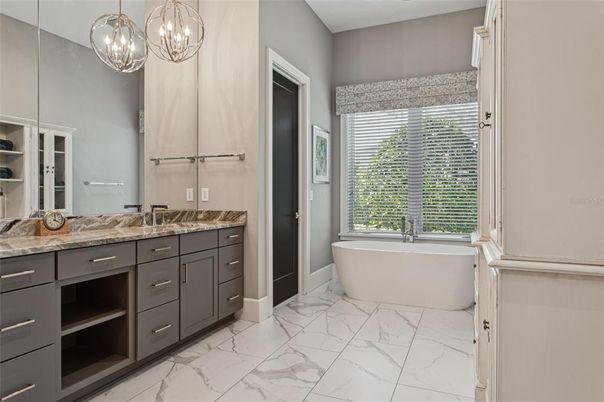 Bathroom, Chandelier, Dual Sink Vanities, Free Standing Baths, Interior, Marble, Pendant Lights