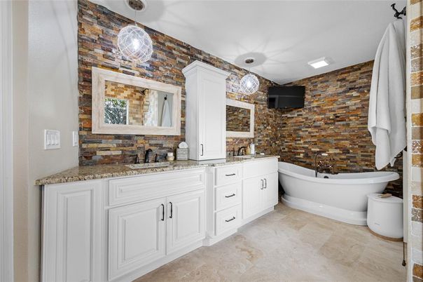Bathroom, Dual Sink Vanities, Free Standing Baths, Interior, Pendant Lights, Stone Walls