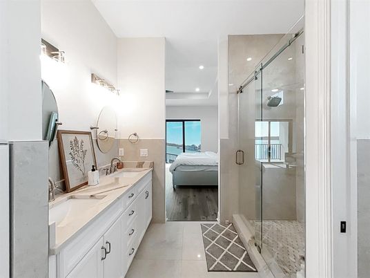 Bathroom, Bedroom, Dual Sink Vanities, Glass Shower, Interior, Recessed Lighting, Wood Texture Flooring