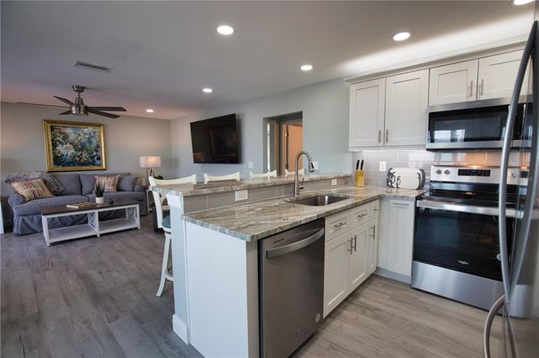 Interior, Kitchen, Living room, Recessed Lighting, Stainless Steel Appliances, Wood Texture Flooring