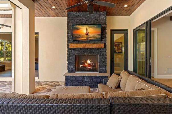Fireplace, Interior, Living room, Recessed Lighting, Stone Walls, Wooden Ceilings