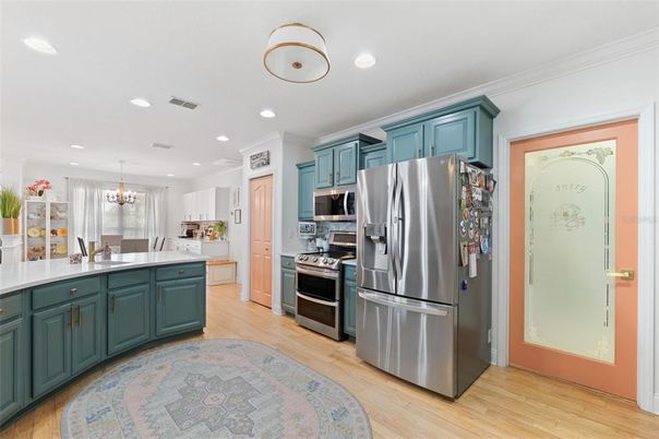 Chandelier, Interior, Kitchen, Recessed Lighting, Stainless Steel Appliances, Wood Texture Flooring