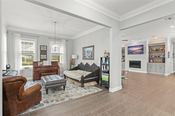Fireplace, Interior, Living room, Pendant Lights, Piano, Recessed Lighting, Wood Texture Flooring