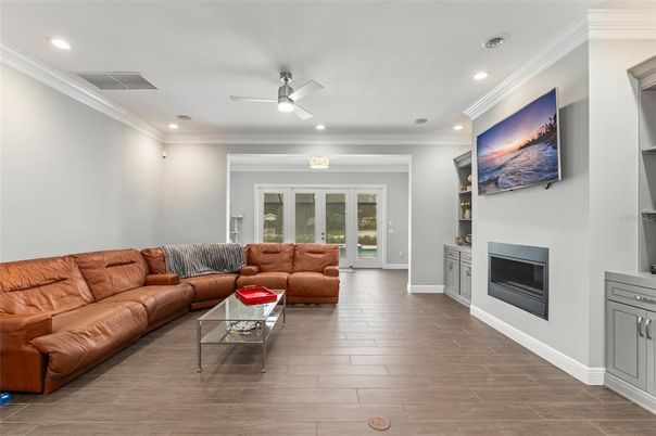 Fireplace, Interior, Living room, Recessed Lighting, Wood Texture Flooring