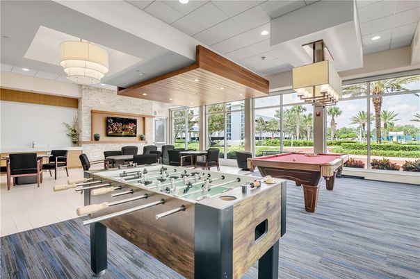 Billiard Table, Chandelier, Dining room, Game Room, Interior, Living room, Pendant Lights, Recessed Lighting, Wood Texture Flooring