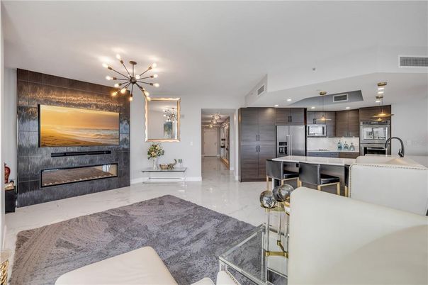 Fireplace, Interior, Kitchen, Marble, Pendant Lights, Recessed Lighting, Stainless Steel Appliances