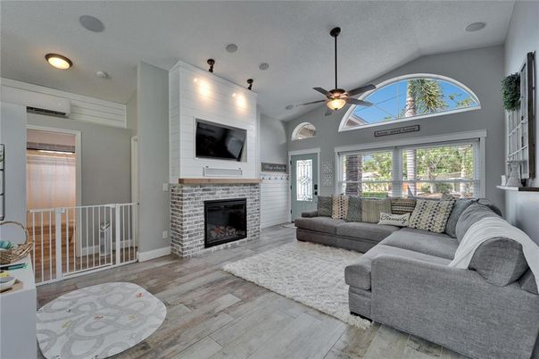 Fireplace, Interior, Living room, Recessed Lighting, Wood Texture Flooring