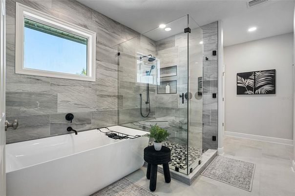 Bathroom, Free Standing Baths, Glass Shower, Interior, Marble Walls, Recessed Lighting