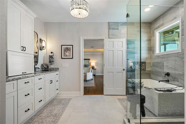 Bathroom, Bedroom, Dual Sink Vanities, Glass Shower, Interior, Recessed Lighting, Wood Texture Flooring