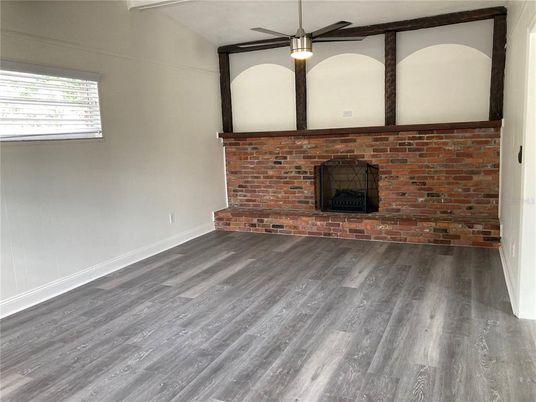 Empty room, Fireplace, Interior, Pendant Lights, Stone Walls, Wood Texture Flooring