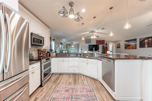 Interior, Kitchen, Pendant Lights, Recessed Lighting, Stainless Steel Appliances, Wood Texture Flooring