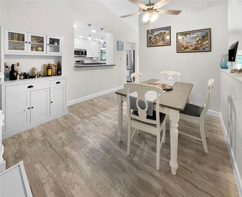 Dining room, Interior, Kitchen, Pendant Lights, Stainless Steel Appliances, Wood Texture Flooring