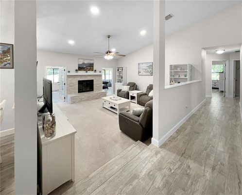 Fireplace, Interior, Living room, Recessed Lighting, Wood Texture Flooring