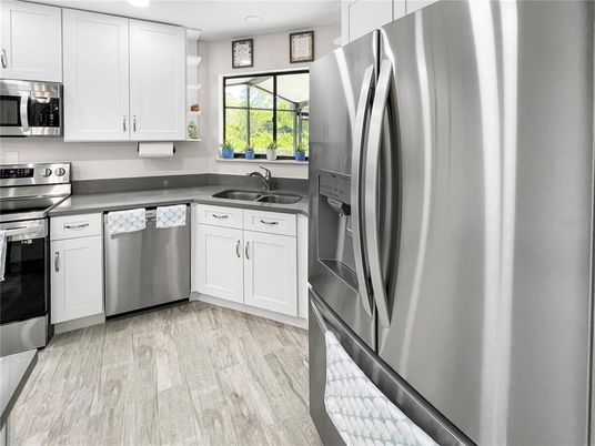 Interior, Kitchen, Recessed Lighting, Stainless Steel Appliances, Wood Texture Flooring
