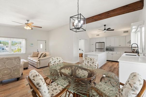 Dining room, Interior, Kitchen, Living room, Pendant Lights, Stainless Steel Appliances, Wooden Beams, Wood Texture Flooring