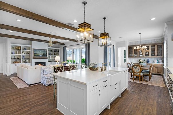 Chandelier, Dining room, Fireplace, Interior, Kitchen, Living room, Pendant Lights, Recessed Lighting, Wooden Beams, Wood Texture Flooring