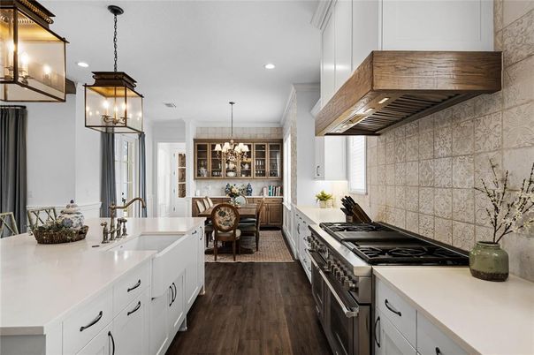 Chandelier, Dining room, Interior, Kitchen, Pendant Lights, Recessed Lighting, Stainless Steel Appliances, Wood Texture Flooring