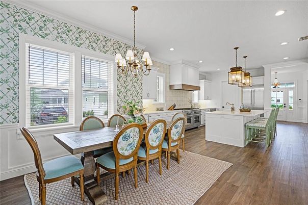 Chandelier, Dining room, Interior, Kitchen, Pendant Lights, Recessed Lighting, Stainless Steel Appliances, Wood Texture Flooring