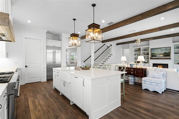 Fireplace, Interior, Kitchen, Living room, Pendant Lights, Recessed Lighting, Stainless Steel Appliances, Wooden Beams, Wood Texture Flooring