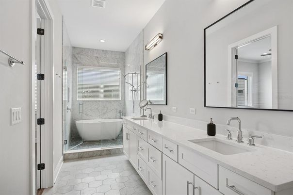Bathroom, Dual Sink Vanities, Free Standing Baths, Interior, Marble, Marble Walls, Recessed Lighting