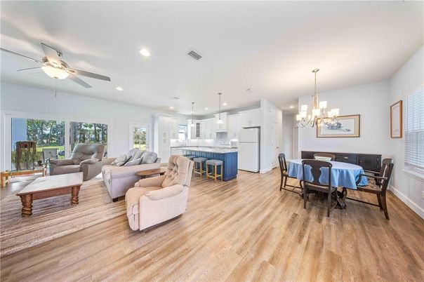 Chandelier, Dining room, Interior, Kitchen, Living room, Pendant Lights, Recessed Lighting, Wood Texture Flooring