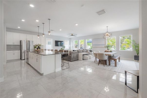 Chandelier, Dining room, Interior, Kitchen, Living room, Pendant Lights, Recessed Lighting, Stainless Steel Appliances