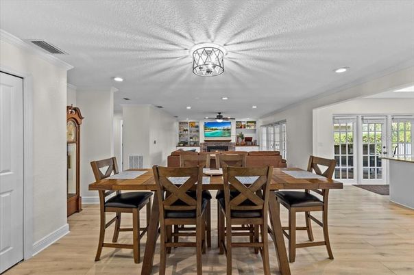 Dining room, Fireplace, Interior, Recessed Lighting, Wood Texture Flooring