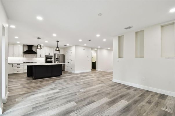 Interior, Kitchen, Pendant Lights, Recessed Lighting, Stainless Steel Appliances, Wood Texture Flooring