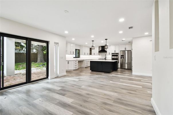 Interior, Kitchen, Pendant Lights, Recessed Lighting, Stainless Steel Appliances, Wood Texture Flooring