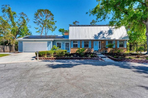 Attached, Exterior, Facade, Solar Panels, Ranch