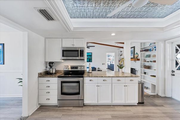 Interior, Kitchen, Recessed Lighting, Stainless Steel Appliances, Wood Texture Flooring