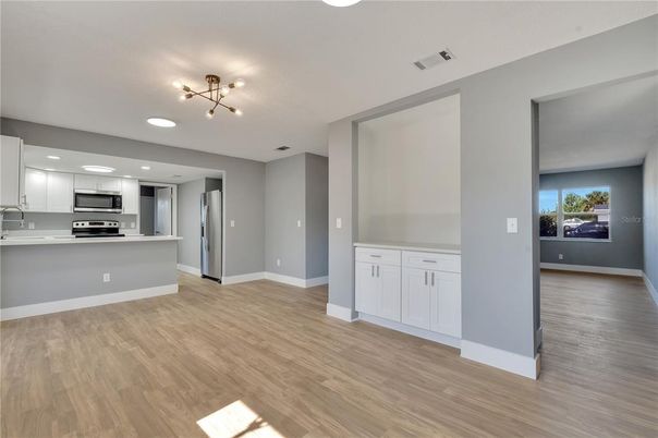 Interior, Kitchen, Recessed Lighting, Stainless Steel Appliances, Wood Texture Flooring