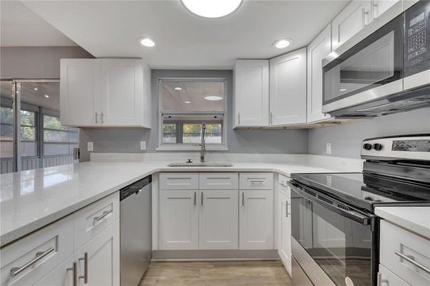 Interior, Kitchen, Recessed Lighting, Stainless Steel Appliances, Wood Texture Flooring