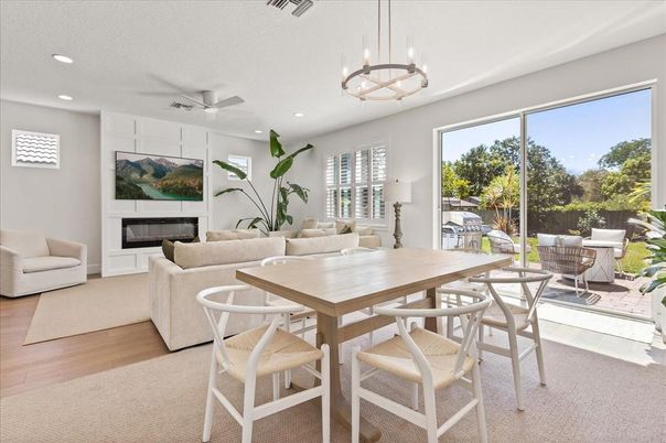 Dining room, Fireplace, Interior, Living room, Pendant Lights, Recessed Lighting, Wood Texture Flooring