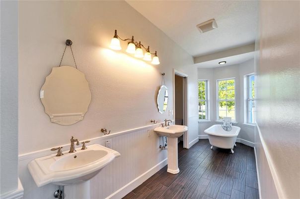 Bathroom, Dual Sink Vanities, Free Standing Baths, Interior, Recessed Lighting, Wood Texture Flooring