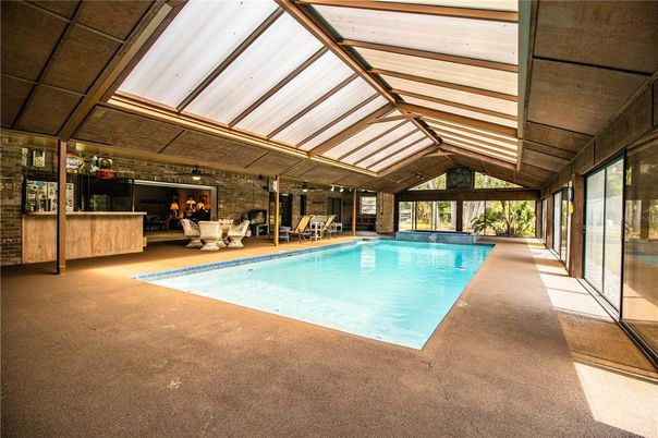 Fireplace, Glass Ceilings, Interior, Pool, Sun Room