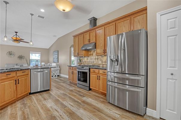 Interior, Kitchen, Pendant Lights, Recessed Lighting, Stainless Steel Appliances, Wood Texture Flooring