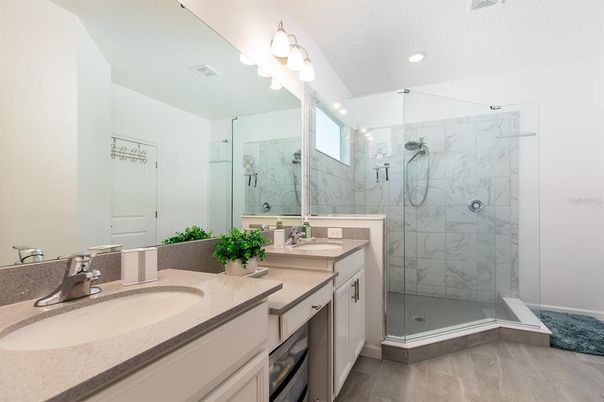 Bathroom, Dual Sink Vanities, Glass Shower, Interior, Marble Walls, Recessed Lighting