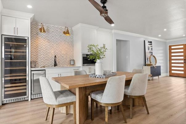Dining room, Interior, Kitchen, Pendant Lights, Recessed Lighting, Stainless Steel Appliances, Wood Texture Flooring