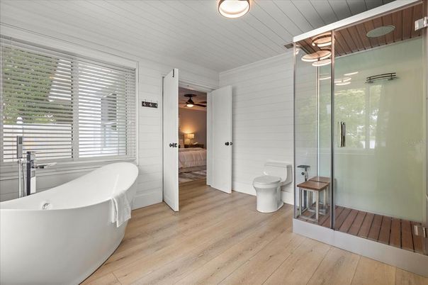 Bathroom, Bedroom, Free Standing Baths, Glass Shower, Interior, Wood Texture Flooring
