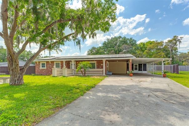 Attached, Backyard, Exterior, Facade, Brick Facade, Solar Panels, Ranch