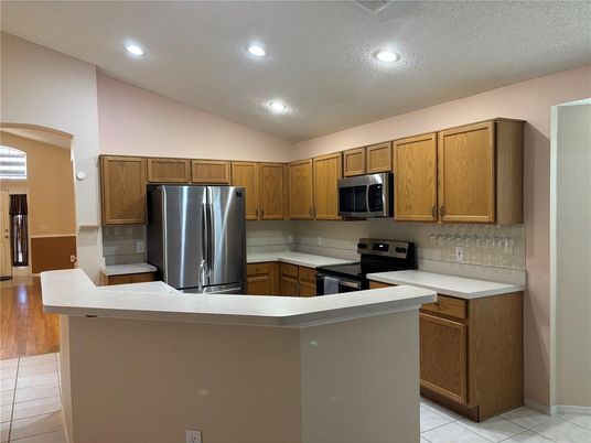 Interior, Kitchen, Recessed Lighting, Stainless Steel Appliances, Wood Texture Flooring
