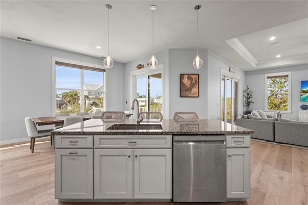 Dining room, Interior, Kitchen, Living room, Pendant Lights, Recessed Lighting, Stainless Steel Appliances, Wood Texture Flooring