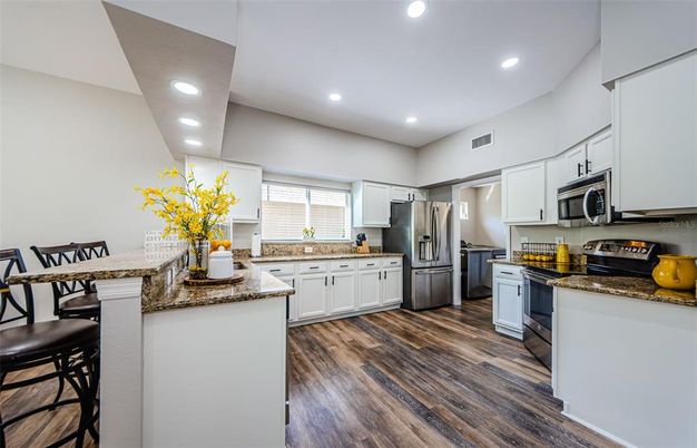 Interior, Kitchen, Recessed Lighting, Stainless Steel Appliances, Wood Texture Flooring
