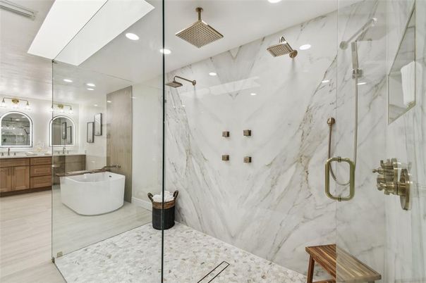 Bathroom, Dual Sink Vanities, Free Standing Baths, Glass Shower, Interior, Marble Walls, Recessed Lighting